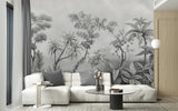 Papier Peint Jungle Tropical Noir Et Blanc Panoramique dans un intérieur moderne et luxueux avec un grand canapé sectionnel blanc, une table basse en verre, et des touches dorées. Illustration d'un paysage tropical dense avec une variété de plantes tropicales comme des palmiers, des fougères, et des plantes à larges feuilles.