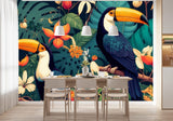 Papier Peint Forêt Animaux Exotique dans une salle à manger contemporaine avec table en bois naturel, chaises beiges et éclairage suspendu blanc. Illustration de toucans perchés sur des branches entourées de végétation luxuriante avec des feuilles de monstera et des fleurs exotiques variées dans un style de livre pour enfants